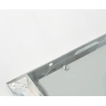 Detalle del marco de empotrar para panel LED 120x30 en techo de escayola
